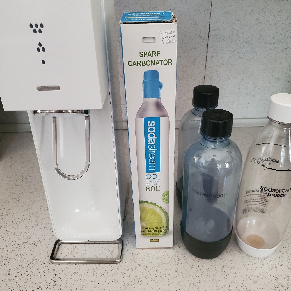 SodaStream soda maker with carbonator refill and bottles